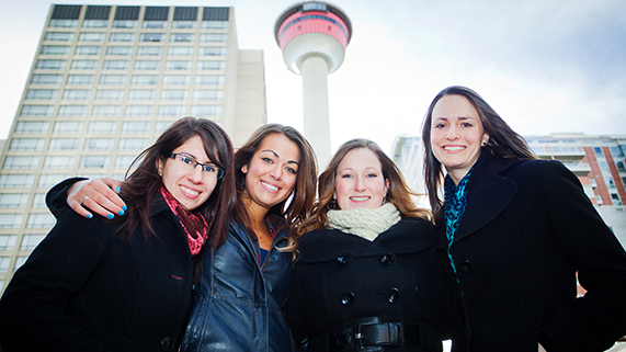 Four women standing outside in Calgary